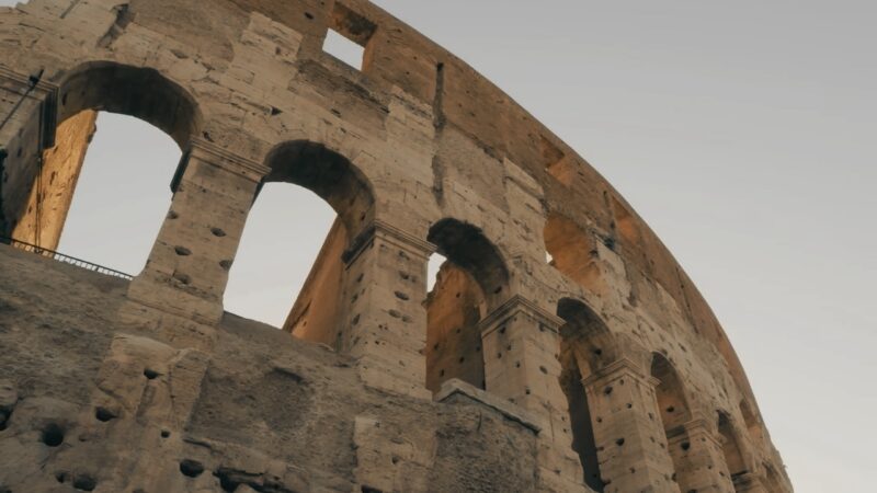 Ancient Colosseum in Rome, a Monumental Symbol of The Roman Empire's Architectural and Cultural Legacy